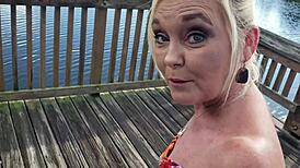 Watch this milf rip clothes tease shaved pussy outdoors flashing pierced nipples