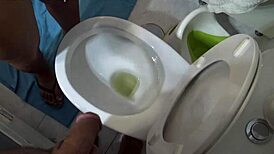 stepmom sneaks peeks at stepson pissing right in front of her