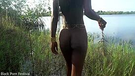 Skinny African village girl struts naked outdoors hunting for cock