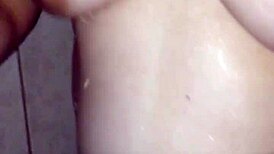 she steps in the shower soaping her big tits and ass