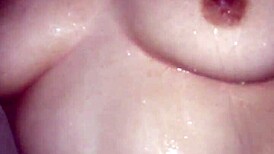 she steps in the shower soaping her big tits and ass