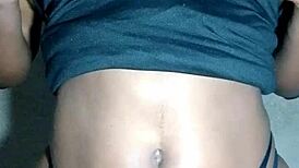 Beautiful black lady massages her huge tits so erotically!