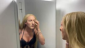 Watch her slip into full crossdressing and embrace the transformation.