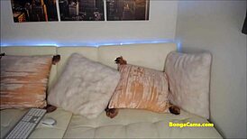 spicy tattooed brunette on bongacams crams huge dildo down throat while fingering wet pussy to squirt