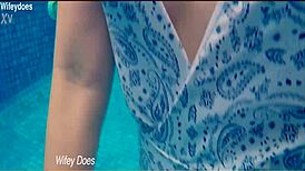 Wife flashes hot one-piece swimsuit at hotel pool