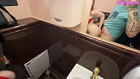 Hey, wanna watch this sexy tattooed wife stroke huge cock in restaurant toilet?
