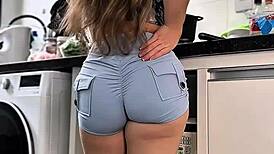 imagine peeling those tight shorts off her very sexy latina big ass in the kitchen