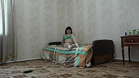 Brunette crams small bottle into hairy pussy and anal double penetration in white socks